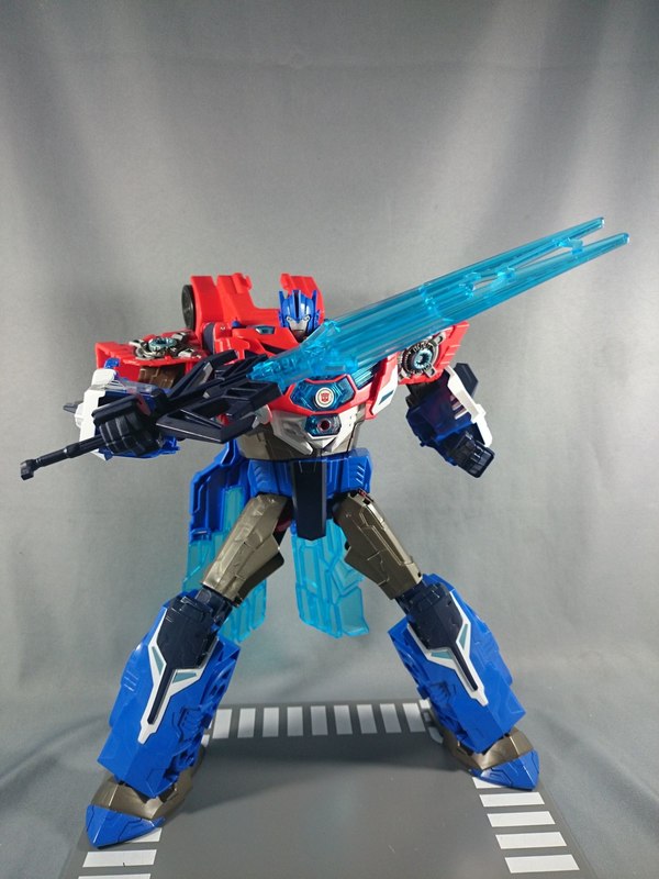 TAV 50 Hypersurge Optimus Prime Transformers Adventure Figure In Hand Photos 04 (4 of 13)